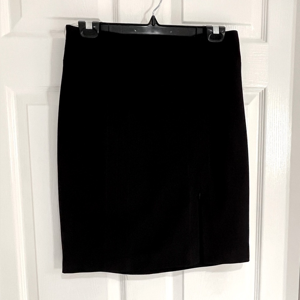 Skirt pencil style skirt Black  size 5
New - waist 15 1/2” length 20”